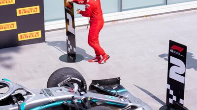 Vettel switched markers post-race to put No 2 in front of Hamilton's car. AP Photo