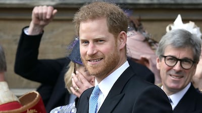 New father Prince Harry following the wedding. AFP