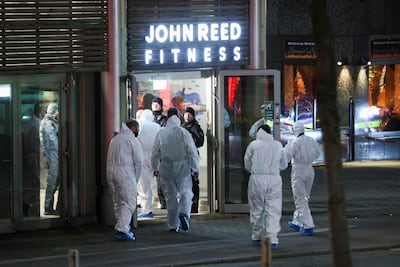 Forensics personnel secure the area after a man seriously injured at least four people with a knife. Reuters.
