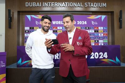 Wasim Akram Junior with Wasim Akram watching videos of Junior's bowling. Photo: ILT20