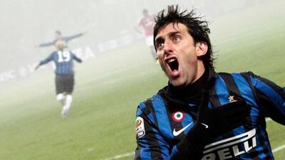 Diego Milito celebrates his winning goal for Inter Milan against AC Milan.