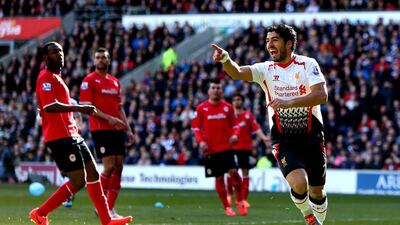 Liverpool's Luis Suarez of Liverpool celebrates during the victory over Cardiff City. Michael Steele / Getty Images / March 22, 2014