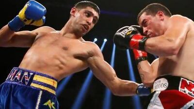 Amir Khan, left, would be one of the biggest names to fight in the Emirates, if the bout against Devon Alexander goes ahead. Lucy Nicholson / Reuters