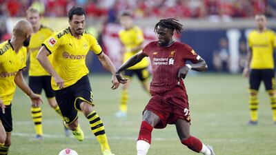 Divock Origi makes a run for Liverpool. AFP
