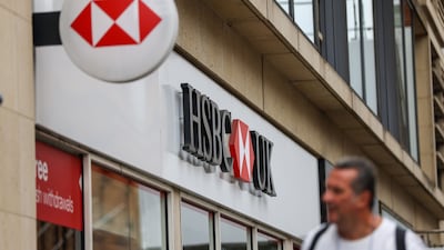 An HSBC branch in London. The lender's first-half income dropped but beat average analyst estimates. Bloomberg