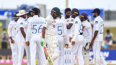 Pakistan captain Babar Azam walks back to the pavilion after his dismissal in Galle. AFP