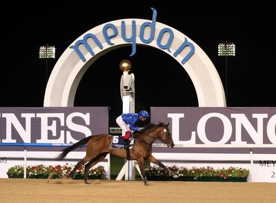 Soft Whisper, ridden by Frankie Dettori, wins the UAE 1000 Guineas at the Dubai World Cup Carnival. Chris Whiteoak / The National