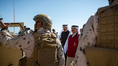 Sheikh Mohamed and King Hamad inspect military equipment during the exercise