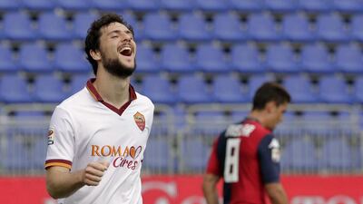 Roma's Mattia Destro celebrates after scoring during a Serie A match against Cagliari on April 6, 2014. Roma moved within five points of Serie A leader Juventus as Mattia Destro scored his first hat trick in a 3-1 win at Cagliari on Sunday. Max Solinas / AP Photo