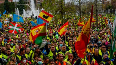 Lorry drivers take to the streets of Madrid in Spain to protest against the high price of fuel. AP