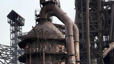 Above, the Ilyich Iron and Steel Works. Rinat Akhmetov, the owner of the factory and richest man in Ukraine, has enlisted his 300,000 employees to end the turmoil unleashed by the armed takeover of pro-Russian separatists in Mairupol. John Moore / Getty Images