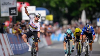 Tadej Pogacar of UAE Team Emirates-XRG crosses the finish line to win the first stage of the Tour of Romandie in Martigny, Switzerland. AFP