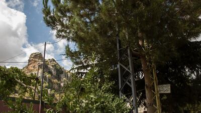 Mountain view from outside Ms Comair's house, where a sign promotes her status as a midwife for the community.