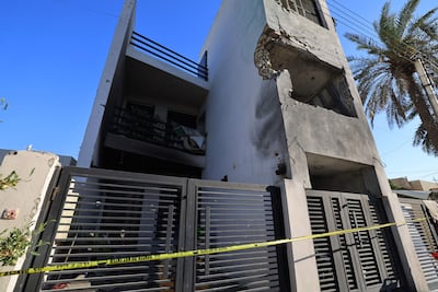 A house in the Amiriya district of western Baghdad that was struck by a projectile on Tuesday evening. AFP