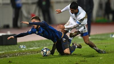 Ilir Krasniqi, left, of Kosovo in action against Dor Peretz of Israel. EPA