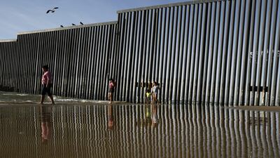 Above, the border structure separating San Diego, California from Tijuana, Mexico. US president Donald Trump's plan to build a wall along its border with Mexico is facing resistance even from his own party. Gregory Bull / AP Photo