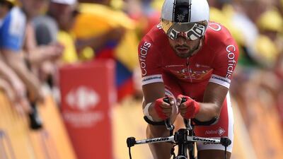 France's Nacer Bouhanni crosses the finish line at the end of a 13.8 km individual time-trial, the first stage of the 102nd edition of the Tour de France cycling race on July 4, 2015, in Utrecht, The Netherlands. AFP PHOTO / ERIC FEFERBERG