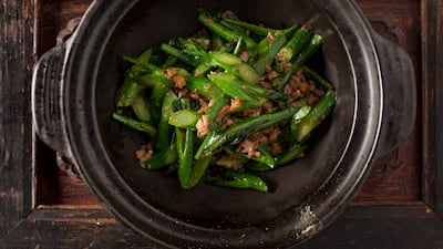 Wok-fried kale is one of many flavourful vegetarian dishes