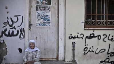 Palestinian refugee Ameenah al-Saadi, 90, looks on at the entrance of her home in the West Bank refugee camp of Jenin. She was 24 years old when she and her husband were forced to leave their home in Zarin village near the the northern Israeli town of Beit Shean.