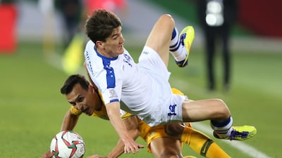 Trent Sainsbury of Australia, left, in action against Eldor Shomurodov of Uzbekistan during the 2019 Asian Cup last-16 match in Al Ain. EPA