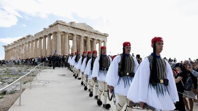 Presidential Guards in procession at the Parthenon in Athens after years of restoration work was completed. AP
