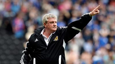 Steve Bruce the Hull manager instructs his players against Cardiff City at KC Stadium on May 04, 2013 in Hull, England. Gareth Copley/Getty Images
