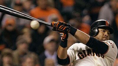 San Francisco Giants' Melky Cabrera fouls off a pitch against Washington.