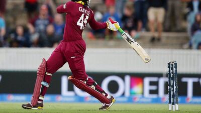 West Indies batsman Chris Gayle hits the ball during their Cricket World Cup win against Zimbabwe on Tuesday in Canberra. Rob Griffith / Getty Images / February 24, 2015