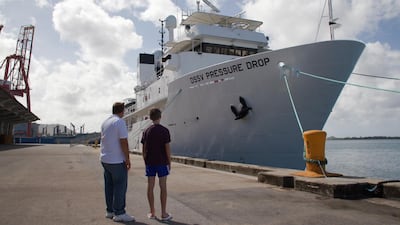 Hamish Harding and his son, Giles, standing in front of expedition yacht DSSV Pressure Drop. Credit: Nick Verola