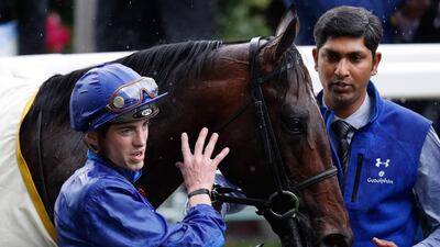 Jockey James Doyle leads horse Blue Point after winning the King's Stand Stakes on Day 1 of Royal Ascot. AFP