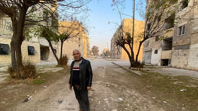 Hassan Al Alloush on a deserted street in the eastern half of Aleppo, Syria's main industrial city. Lizzie Porter / The National