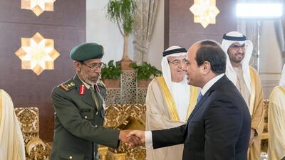 Lt General Hamad Thani Al Romaithi, Chief of Staff UAE Armed Forces (L), greets Abdel Fattah El Sisi, President of Egypt (R), during a reception at the Presidential Airport. They are seen with Zaki Anwar Nusseibeh (C) and Dr Sultan Al Jaber, UAE Minister of State, Chairman of Masdar and CEO of ADNOC Group (back R). Rashed Al Mansoori / Crown Prince Court - Abu Dhabi