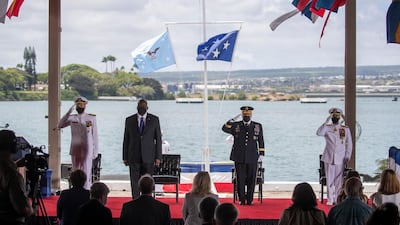Adm Philip S Davidson, left to right, US Secretary of Defence Lloyd Austin, Chairman of the Joint Chiefs of Staff Gen Mark A Milley and Adm John C Aquilino attend a Change of Command ceremony at Pearl Harbour. Cindy Ellen Russell/Honolulu Star-Advertiser via AP