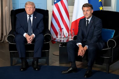 Donald Trump with French President Emmanuel Macron at a G7 summit on Monday. Getty Images