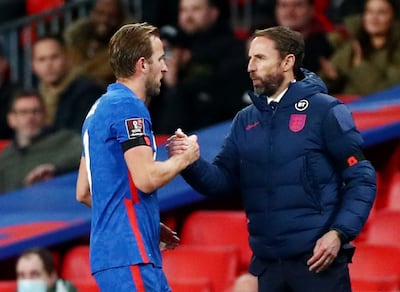 Harry Kane shakes hands with manager Gareth Southgate after being substituted. Reuters
