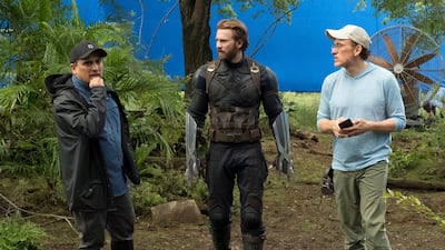 Joe and Anthony Russo on the 'Avengers: Infinity War' set with Chris Evans. Marvel / Disney / Kobal / Shutterstock