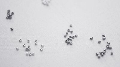 2. Next stop, L’Atelier Montex, where the silk tulle is embroidered using the Lunéville technique, a type of embroidery combining needlework and crochet. This is executed on the underside of the fabric on an embroidery frame, with one hand holding the hook and the other beneath the frame, moving the beads and tubes forward. The embroidery of the dress requires 945 hours of work in the Montex ateliers, using 425,000 beads and faceted tubes. Courtesy Chanel