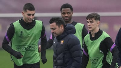 Barcelona coach Xavi Hernandez with players Ferran Torrres, Ansu Fati and Gavi. EPA