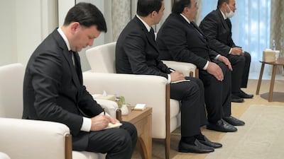 The Turkmen delegation accompanying Mr Berdymukhamedov attend a meeting at Al Shati Palace, Abu Dhabi. Hamad Al Kaabi / Ministry of Presidential Affairs