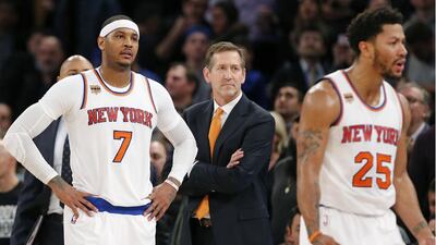 New York Knicks forward Carmelo Anthony, left, has come in for criticism from franchise director Phil Jackson. Kathy Willens / AP Photo