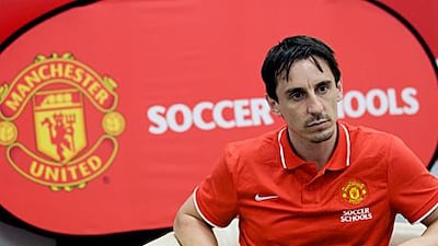 Gary Neville speaks in Abu Dhabi yesterday.