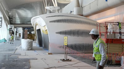 The latest immigration controls and artificial intelligence will help process 11,000 passengers an hour. Pawan Singh / The National