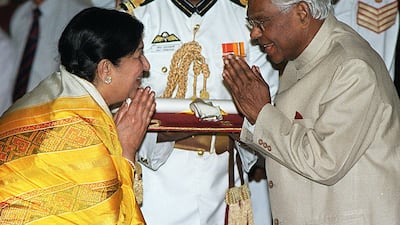 Mangeshakar with Indian president K R Narayanan in March 2001, when she was bestowed with the Bharat Ratna, India's highest civilian award. AFP