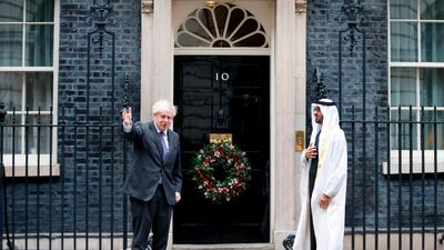 British Prime Minister Boris Johnson (l) extends a warm welcome to Crown Prince of Abu Dhabi and Deputy Supreme Commander of the Armed Forces, Sheikh Mohamed bin Zayed, outside 10 Downing Street, London. AFP