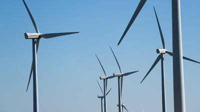Wind turbines are seen at an Acciona Energia wind park in Puebla de Almenara, Spain. Wind and solar power capacity grew by 238 gigawatts globally in 2020. Reuters