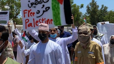 Omanis took to the streets to support the Palestinian cause. Saleh Al-Shaibany for The National