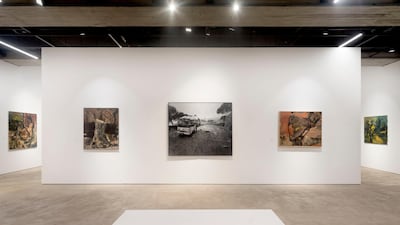 Two paintings by Tagreed Darghouth flank a single work by painter Oussama Baalbaki. Courtesy of Saleh Barakat Gallery