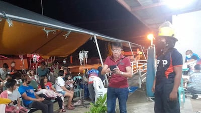 A BFP worker overseeing the hospital evacuation. Reuters