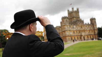 Visitors attend a 1920s themed event at Highclere Castle, near Newbury, west of London, ahead of the world premiere of the Downton Abbey film. AFP