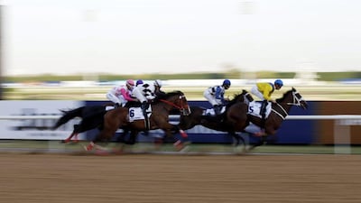 Jockeys on their horses compete during the UAE Derby race during the Dubai World Cup 2016 at the Meydan race course in Gulf emirate of Dubai, United Arab Emirates, 26 March 2016. The Dubai World Cup is one of the richest events in the horse racing sporting calendar. EPA/ALI HAIDER